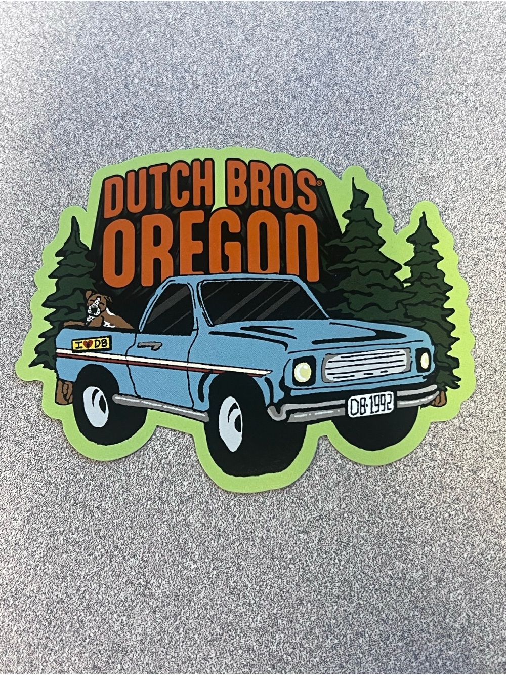 Dutch Bros Blue Pickup Sticker with Orange Lettering and Green Border